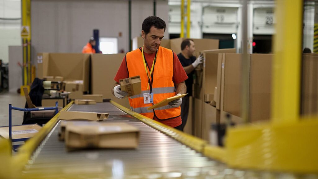 Amazon bumps average warehouse pay and adds free Prime membership