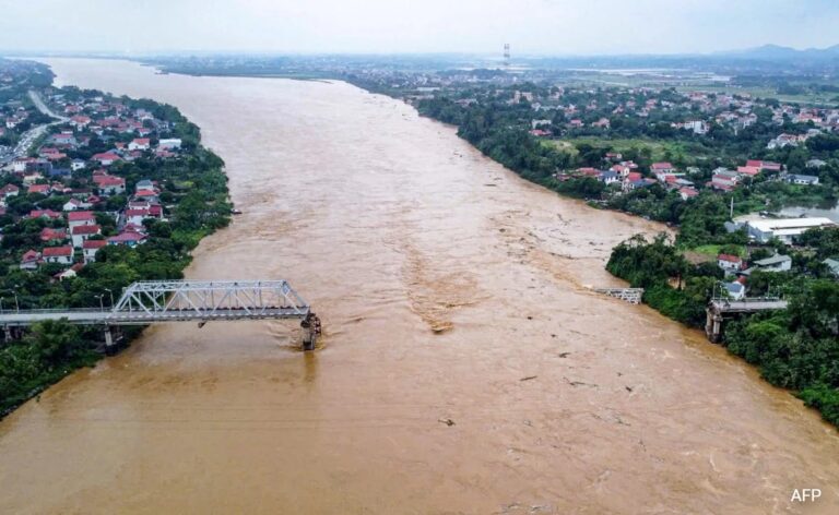 Phong Chau Bridge Collapses Vehicles Plunge Into River